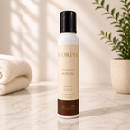 Recipient alb și înalt FLORÉVA Energy Mousse 200 ml, cu capac negru, pe blat deschis la culoare.